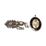 A large Georgian memorial locket pendant, circa 1780, the oval plaque with interior depicting a