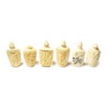 Six ivory snuff bottles, circa 1900 (one stopper lacking)