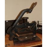 Late 19th/early 20th century printing shop contents: A table mounted page guillotine together with a