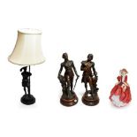 A Royal Doulton Top O' The Hill figure; three Lladro models; together with a pair of Spelter figures