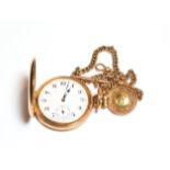 A gold plated full hunter pocket watch, with an attached curb link watch chain with each link