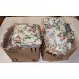 Three pairs of glazed chintz floral curtains with pink rose heads, blue silk ribbons, lined and