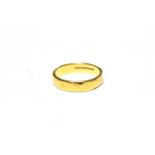 A 22 carat gold textured band ring, finger size H. Gross weight 3.6 grams