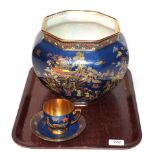 A Carlton ware blue chinoiserie ''Mikado'' octagonal lustre bowl and similar tea cup and saucer