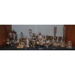 A quantity of silver plate including candlesticks, trays, tea wares etc