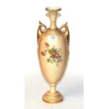 A Royal Worcester blush ivory twin-handled vase