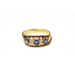 An 18 carat gold sapphire and diamond ring, finger size P1/2. Gross weight 3.7 grams.