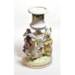 A 19th century Continental hard paste porcelain figural centre piece in the form of the four