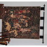 A Medieval style hanging tapestry, by Hines of Oxford, machine made, with pole; together with a