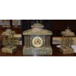 A green onyx striking mantel clock with garniture, retailed by W Lockwood, 3 Victorian Lane,