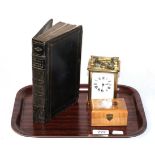 A brass carriage timepiece, Mauchline ware box and The Pilgrims Progress by John Bunyan, printed for