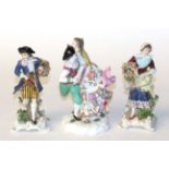 A pair of 19th century Pairs porcelain figures, together with a similar figure group of dancers (3)