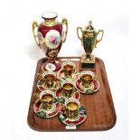 Six decorative Continental gilt-highlighted coffee cup and saucers, together with two similar twin-