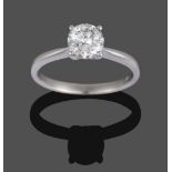 A Platinum Diamond Solitaire Ring, the round brilliant cut diamond in a four-claw setting, to a