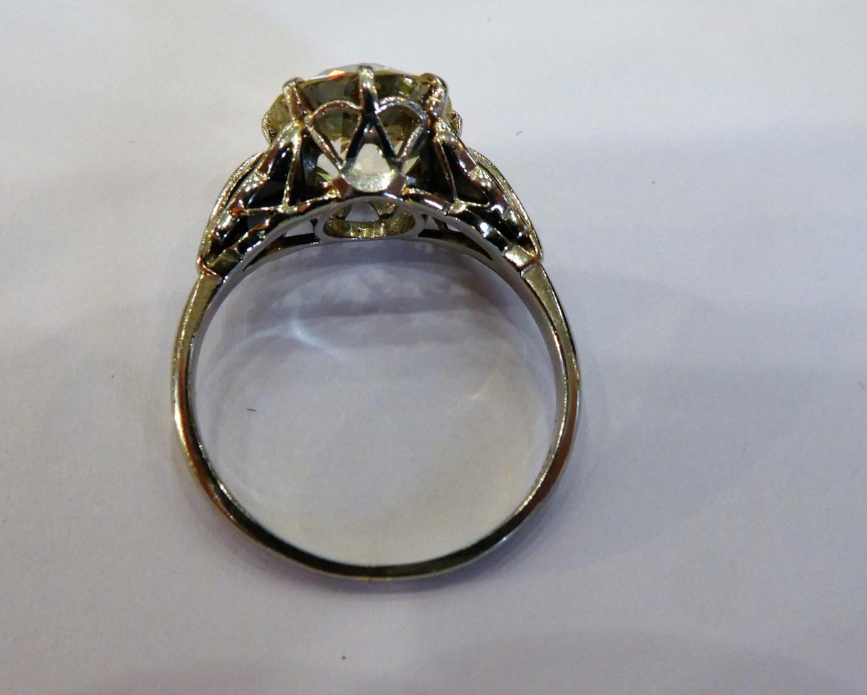 A Diamond Solitaire Ring, the old cut diamond in a white claw setting, to fancy panelled shoulders - Image 2 of 7