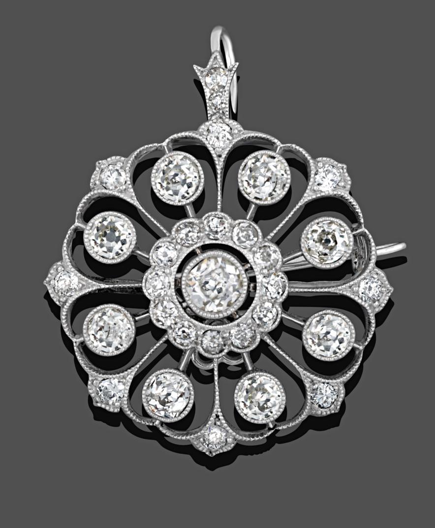 A Diamond Brooch/Pendant, circa 1910, an old cut diamond centrally within a border of smaller old