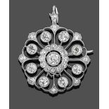 A Diamond Brooch/Pendant, circa 1910, an old cut diamond centrally within a border of smaller old