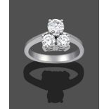 A Diamond Three Stone Ring, the graduated round brilliant cut diamonds in a trefoil formation in