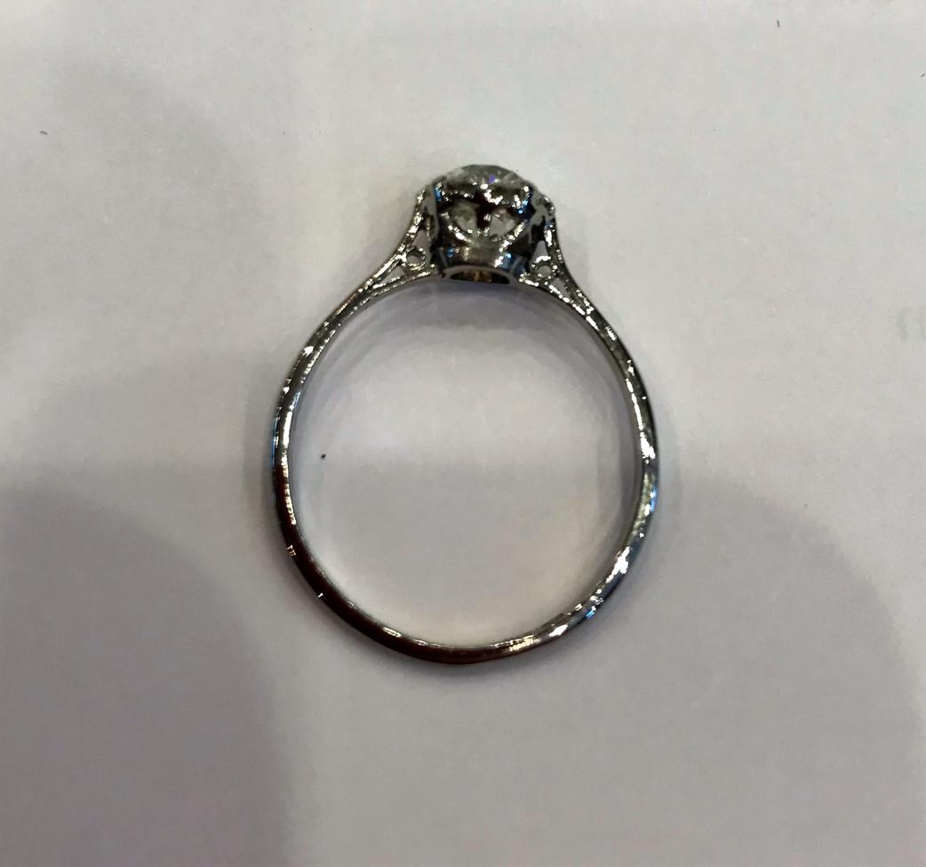 A Diamond Solitaire Ring, the old cut diamond in a white claw setting on a tapered shoulder plain - Image 2 of 5