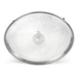 A George III Silver Salver, by John Scofield, London, 1788, plain oval and on four shell and