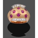 A Ruby and Diamond Ring, by Van Cleef & Arpels, eight old cut rubies in yellow star settings, to old