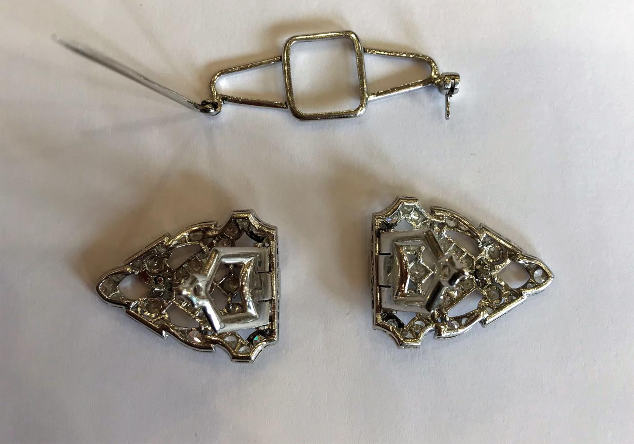An Art Deco Diamond Double Clip Brooch, the geometric form inset with baguette cut, old cut and - Image 2 of 3