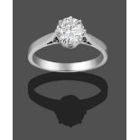 An 18 Carat White Gold Diamond Solitaire Ring, the round brilliant cut diamond in a claw setting