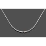 A Diamond Rivière Necklace, the graduated round brilliant cut diamonds in white claw settings, total