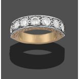 An 18 Carat Gold Diamond Seven Stone Ring, the round brilliant cut diamonds in white claw and