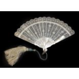 A Scarce Carved and Pierced Cream Mother-of-Pearl Fan,