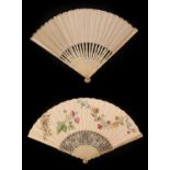 A Mid-18th Century Ivory Fan, the ivory guards deeply carved with scrolls and flowers,