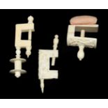 Three Small 19th Century Ivory Sewing Clamps, comprising one example with a pink pincushion,