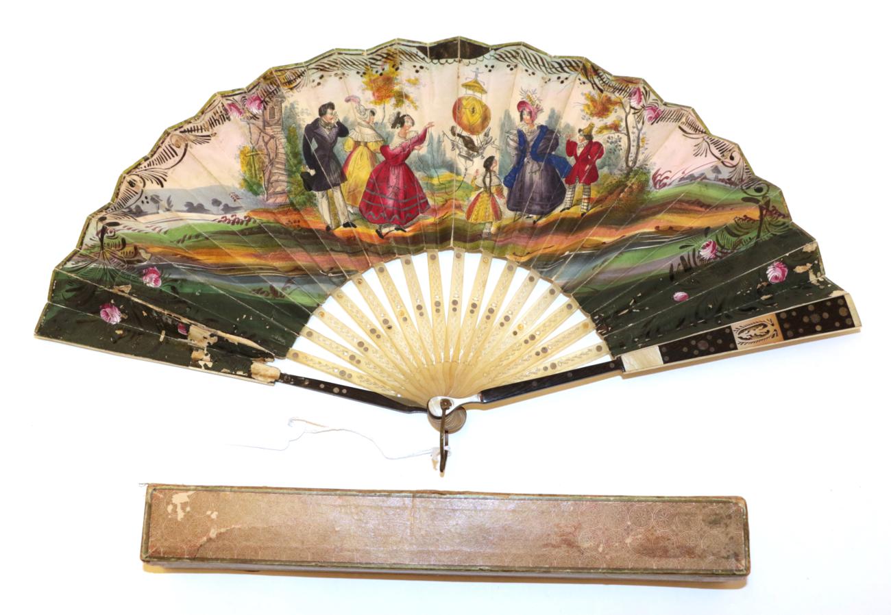 A Circa 1830's Wood and Horn Fan, the monture having wood guards dyed black,