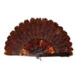 A Good Pheasant Feather Fan, circa 1880's, the monture a large brisé fan in tortoiseshell,