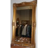 ^ A large rectangular reproduction gilt framed mirror