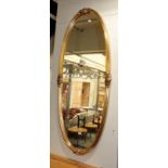 ^ A large reproduction gilt framed oval hall mirror