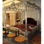 ^ A reproduction silvered four-poster bed