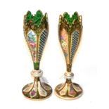 A pair of Bohemian gilt decorated green glass vases with painted flowers CONDITION