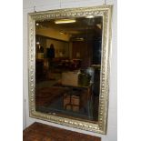 ^ A silvered hall mirror with leaf and rope-twist carved border