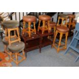 ^ Two pairs of reproduction mahogany side tables, a set of four leather topped high stools,