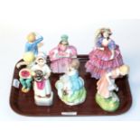 Four Royal Doulton figures including 'Mary Mary', 'Little Boy Blue',