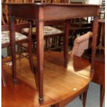 An Edwardian inlaid mahogany, serpentine fronted hall table, raised on square section tapering legs,