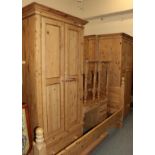 ^ A matched pine five-piece bedroom suite, comprising two single wardrobes, each fitted with base