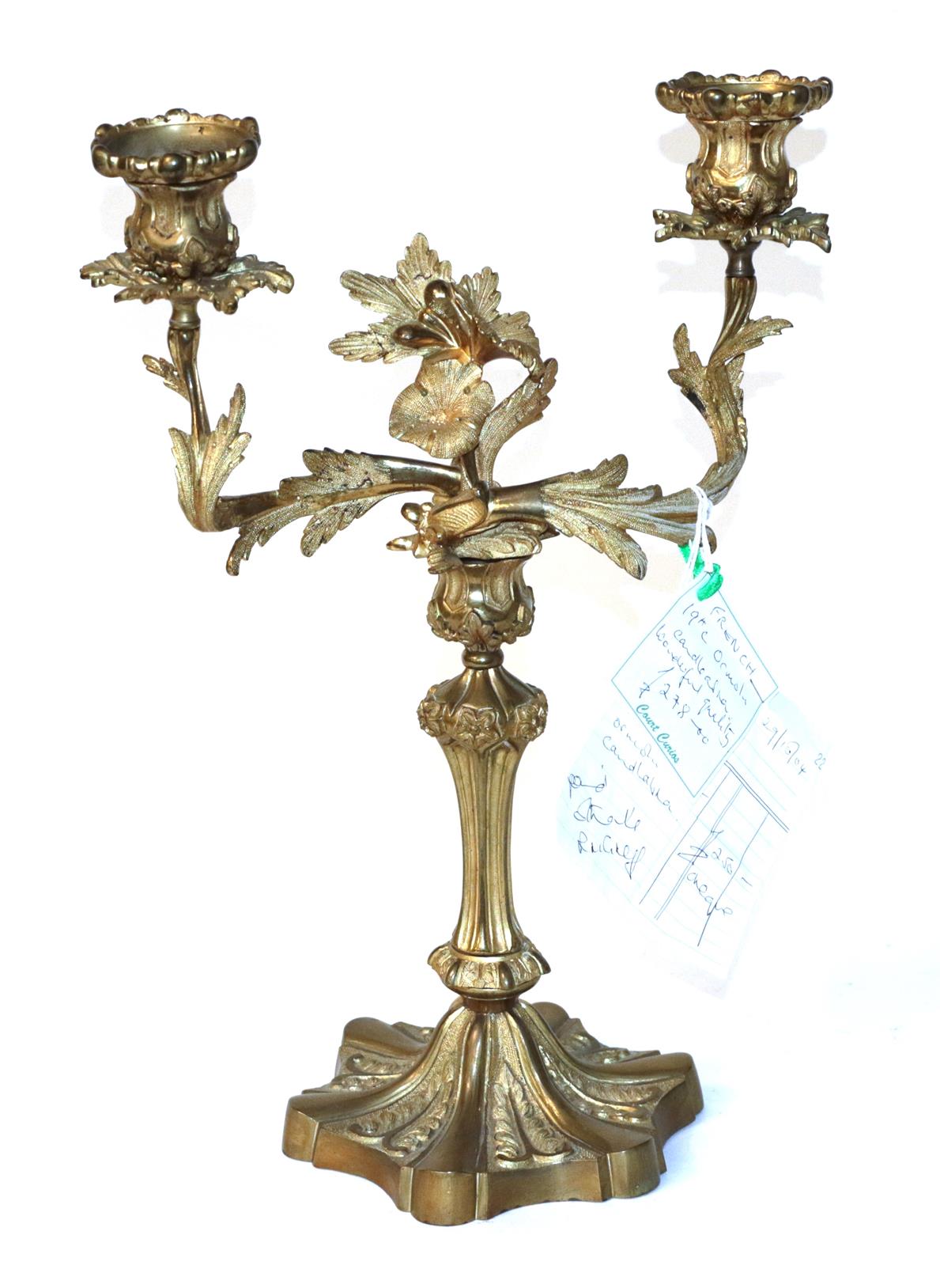 A gilt metal 19th century twin branch candelabra (including original purchase receipt)