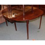 A George III mahogany gate-leg dining table