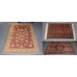 An Oriental rug, the ivory field with of angular vines around an indigo medallion,