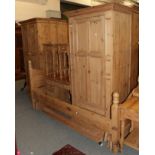 ^ A matched pine bedroom suite (20th century), comprising two single wardrobes, each fitted with
