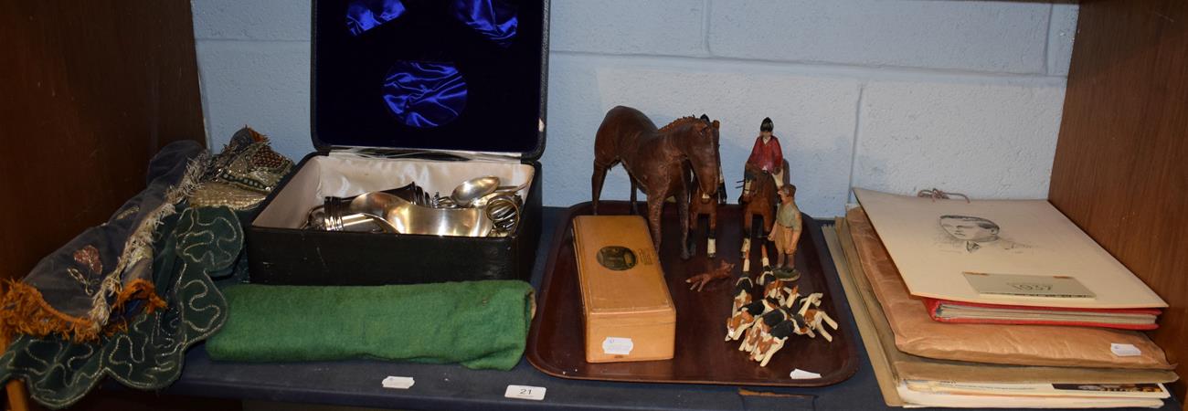 A carved fox hunting pack; Edith Reynolds leather horse; Schweppes calendars; coins; plated wares;