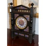 An Aesthetic movement striking ebonised mantel clock,