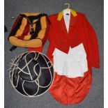 Red hunting tails jacket with brass button initialled 'CH',
